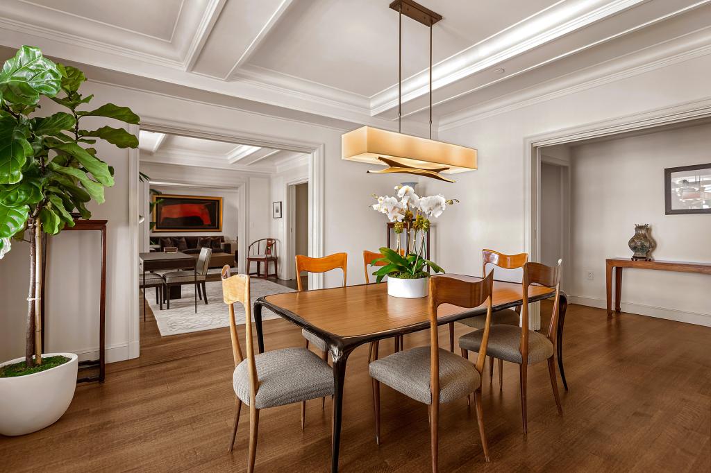 A three-bedroom residence in the Mark Hotel, Upper East Side, with a dining table and chairs.